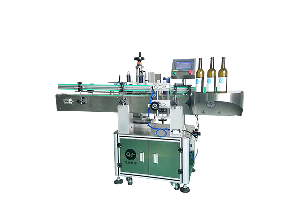 全自動立式定位圓瓶貼標機.jpg